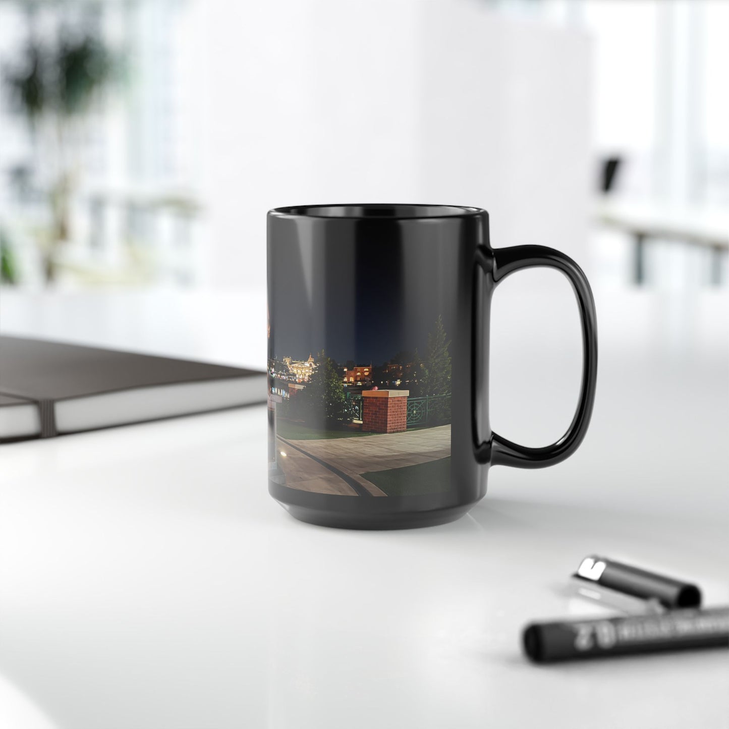 The Simpsons Photo Mug — University Statue & Campus Lights (Black 11oz/15oz)