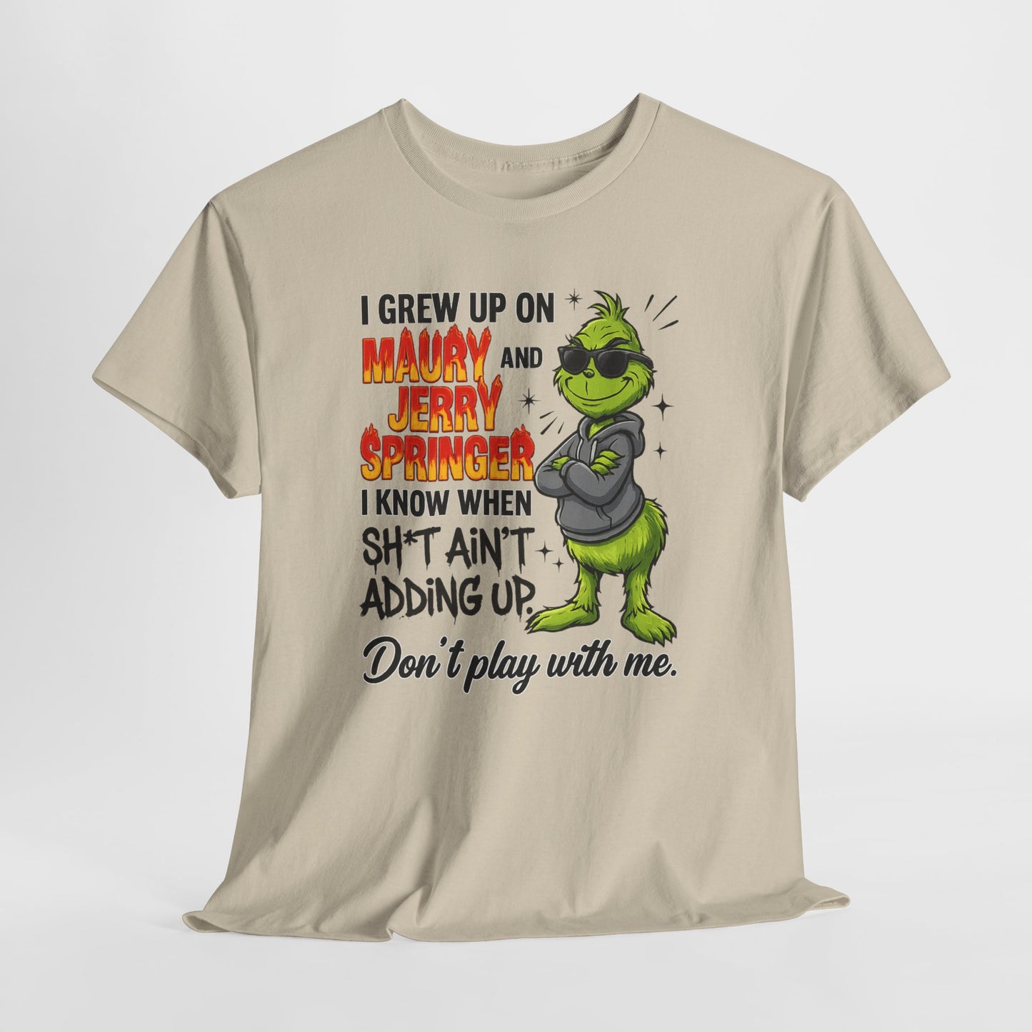 Grinch Cartoon Tee — "I Grew Up on Maury and Jerry Springer" Funny Holiday Shirt