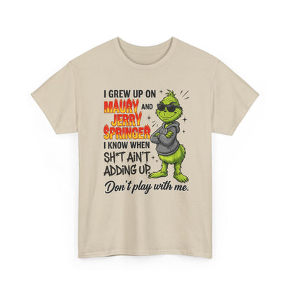 Grinch Cartoon Tee — "I Grew Up on Maury and Jerry Springer" Funny Holiday Shirt