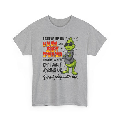 Grinch Cartoon Tee — "I Grew Up on Maury and Jerry Springer" Funny Holiday Shirt
