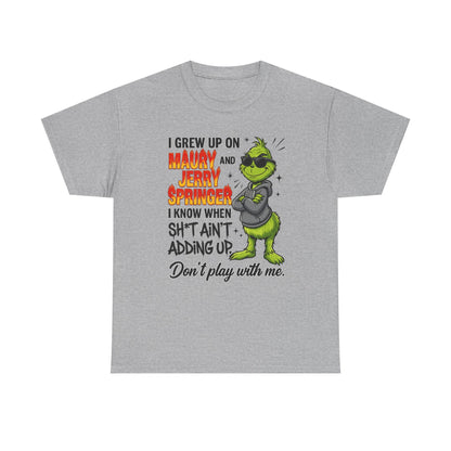 Grinch Cartoon Tee — "I Grew Up on Maury and Jerry Springer" Funny Holiday Shirt