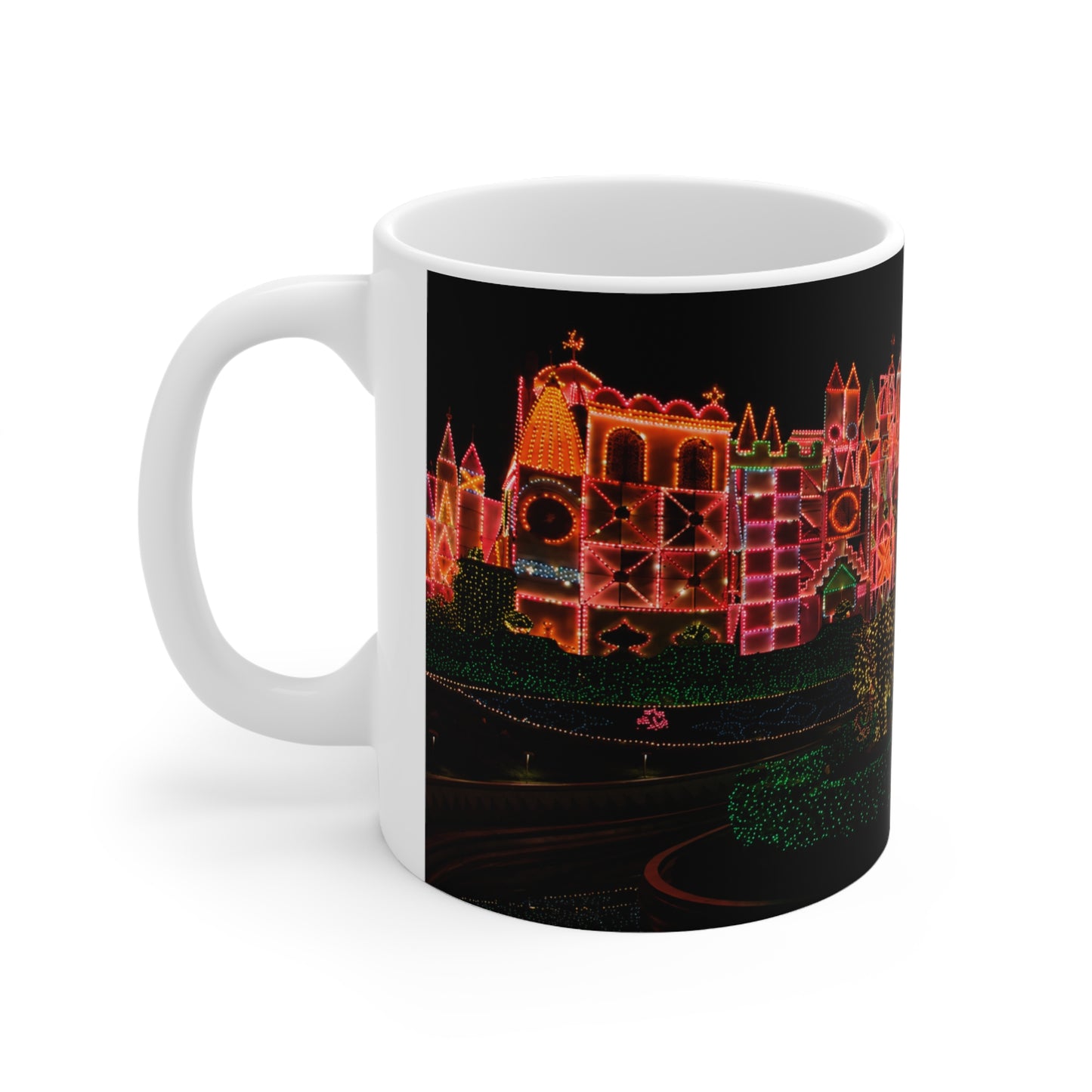 Disneyland It's a Small World Taken at night Ceramic Mug — Festive Neon Christmas Coffee Cup (11oz & 15oz)