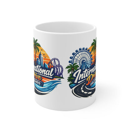 Orlando International Drive Souvenir Mug — 11oz/15oz Ceramic Coffee Cup with Ferris Wheel & Sunset Design